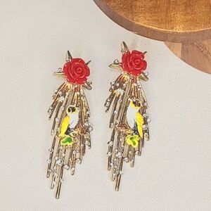 Anthropologie Gold Owl Earrings with red roses detail. EUC